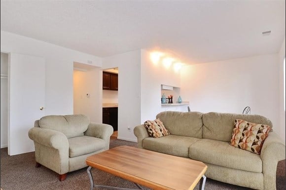 A spacious living room at Pangea Vineyards Apartments in Indianapolis.